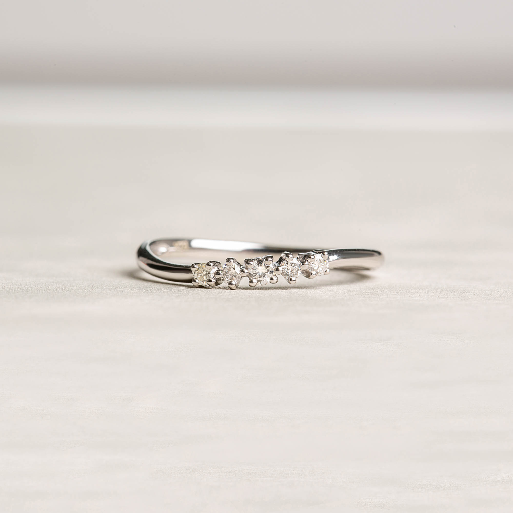 Five Diamonds Curved Ring
