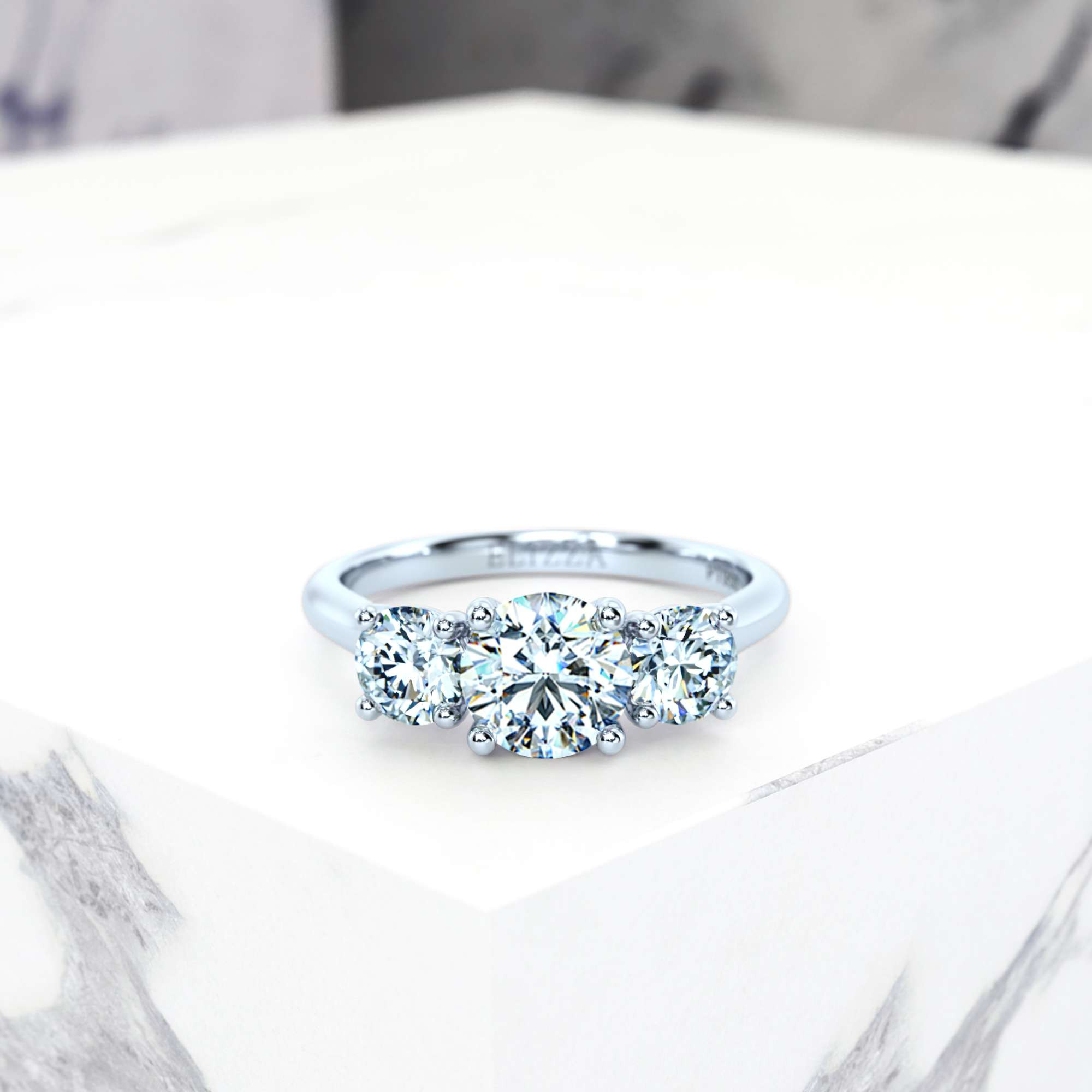 three stone round platinum elizza engagement ring